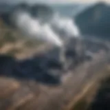 Aerial view of a coal power plant in China amidst a mountainous backdrop.